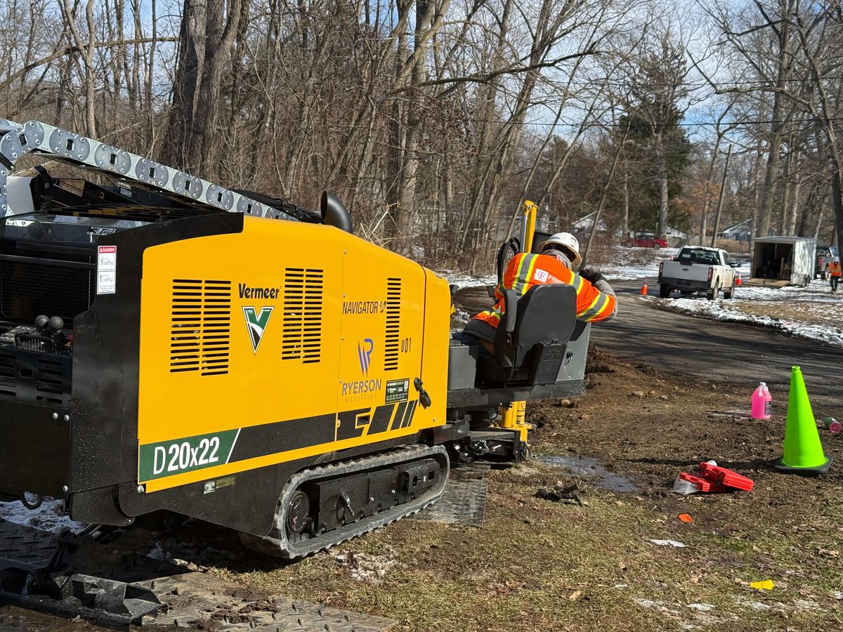 Vermeer D20x22 HDD rig with Ryerson Utilities operator on fiber installation site