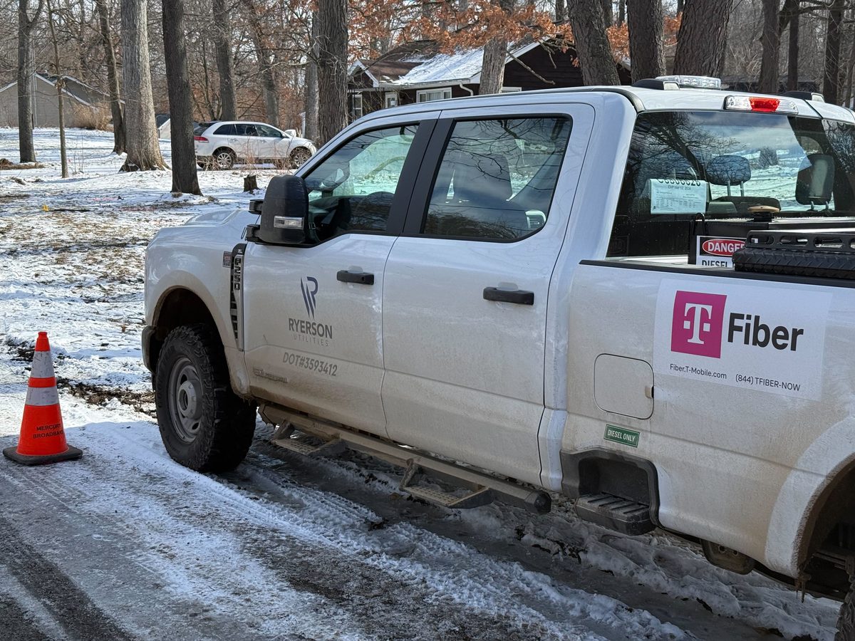 Ryerson Utilities truck with T-Fiber branding on job site